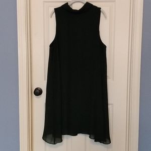 Green dress with floating overlay